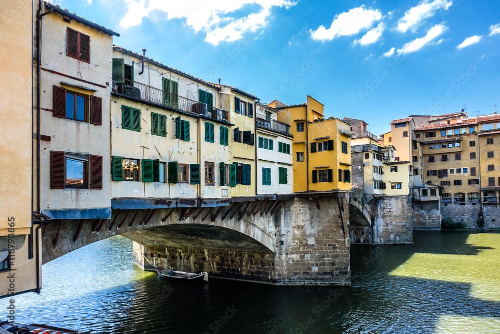 Bridge Ponte Vecchio (1345) on Arno river in Florence, Italy. Bridge Ponte Vecchio (1345) on Arno river in Florence, Italy.
