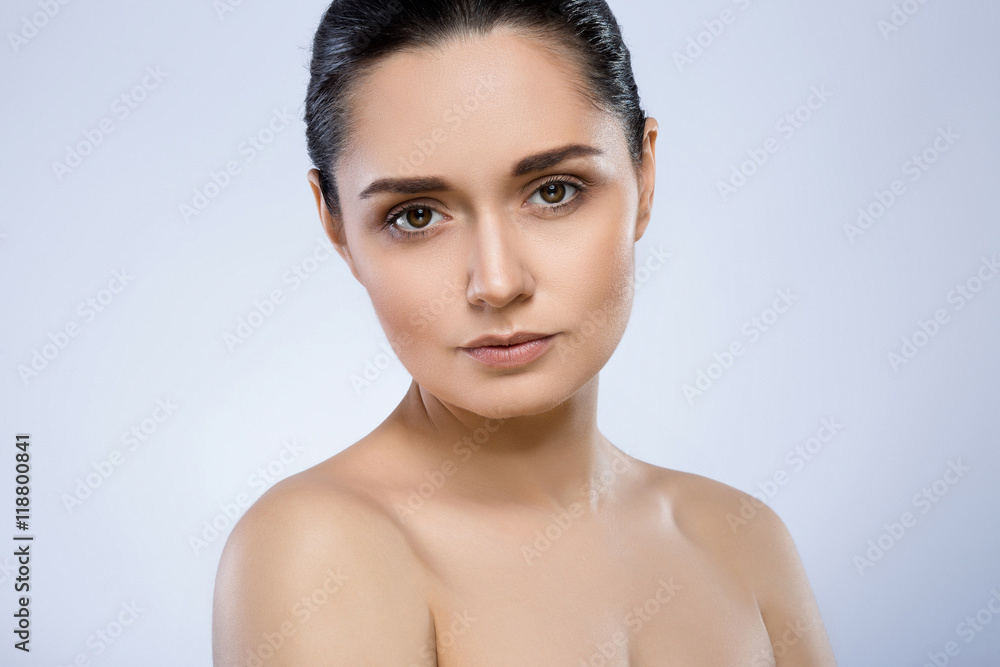 Beautiful girl with nude make up at studio Beautiful girl with nude make up at studio