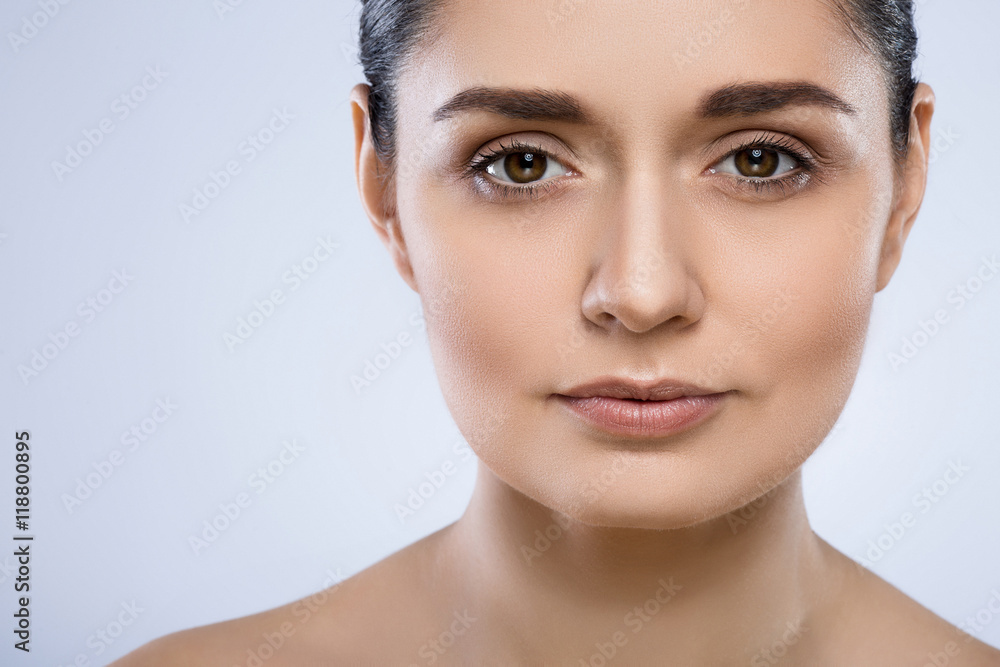 Beautiful girl with nude make up at studio Beautiful girl with nude make up at studio