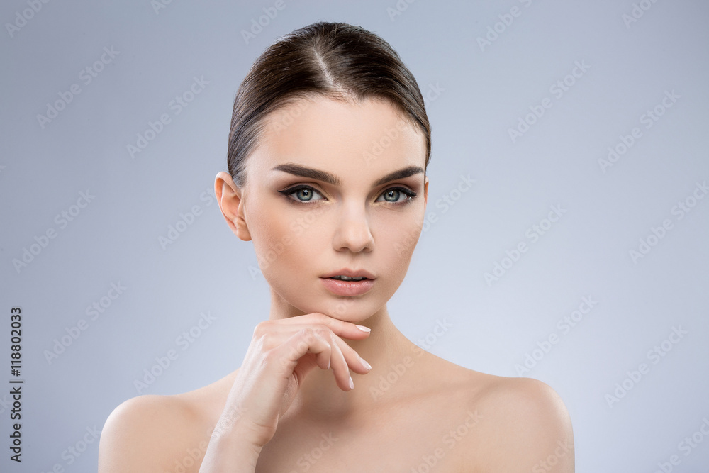 Beautiful girl with nude make up at studio Beautiful girl with nude make up at studio