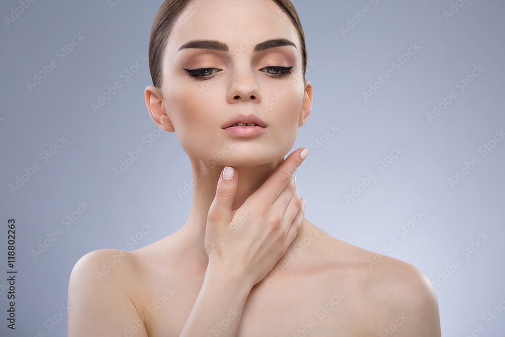 Beautiful girl with nude make up at studio Beautiful girl with nude make up at studio