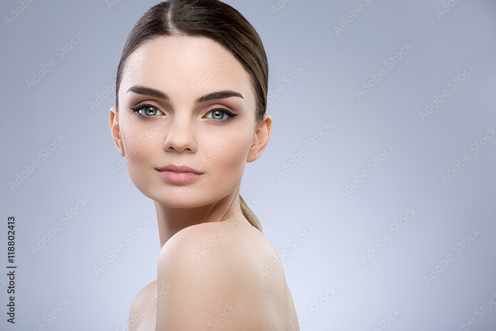 Beautiful girl with nude make up at studio Beautiful girl with nude make up at studio