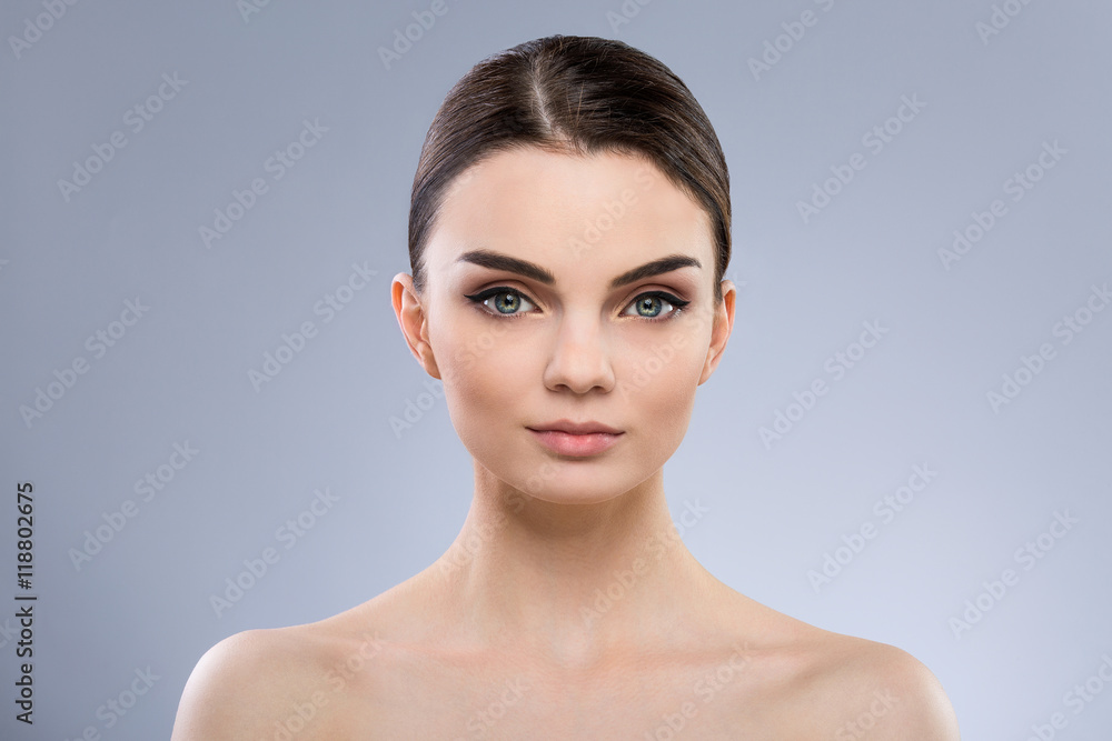 Beautiful girl with nude make up at studio Beautiful girl with nude make up at studio