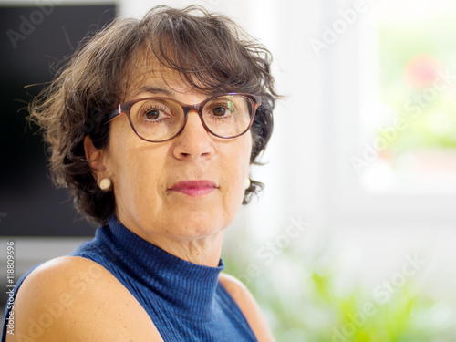 portrait of a mature woman with glasses
