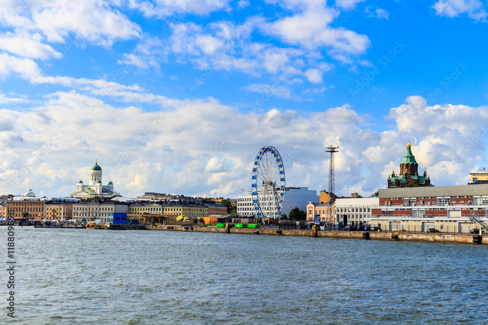 Panorama Of Embankment In Helsinki At Summer Sunset Evening, Sunrise Morning, Finland. Cityscape View From Sea Panorama Of Embankment In Helsinki At Summer Sunset Evening, Sunrise Morning, Finland. Cityscape View From Sea