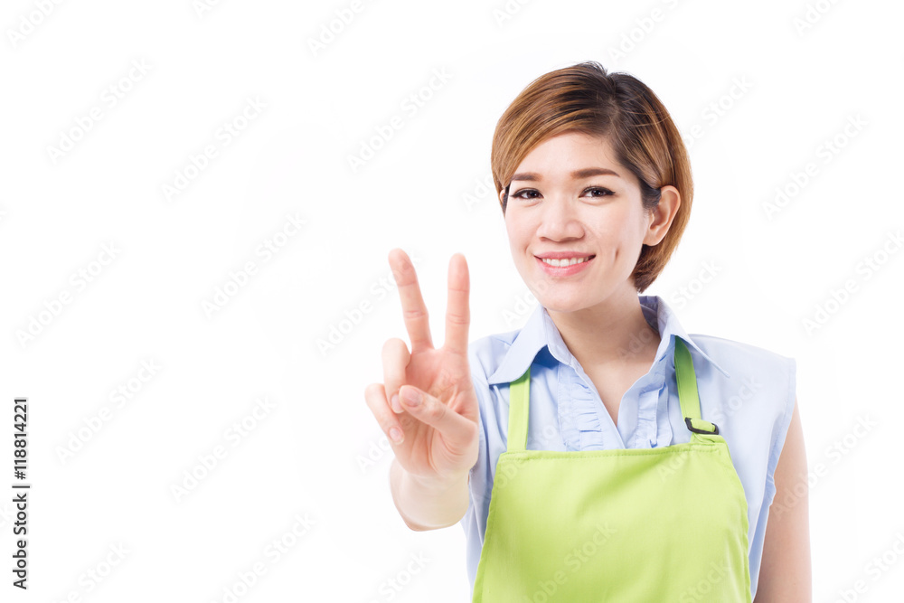 smiling, happy, positive woman small business owner pointing up smiling, happy, positive woman small business owner pointing up