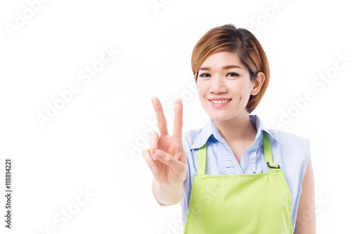 smiling, happy, positive woman small business owner pointing up