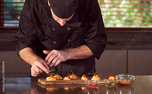 Restaurant hotel private chef preparing making canapes starters