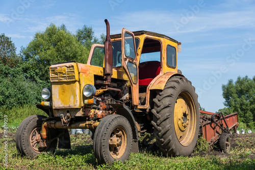 tractor digging potatoes