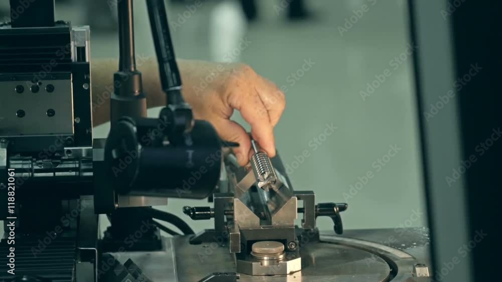 Milling metalworking process. Industrial CNC machining of metal detail by cutting end-tooth vertical mill at factory Milling metalworking process. Industrial CNC machining of metal detail by cutting end-tooth vertical mill at factory