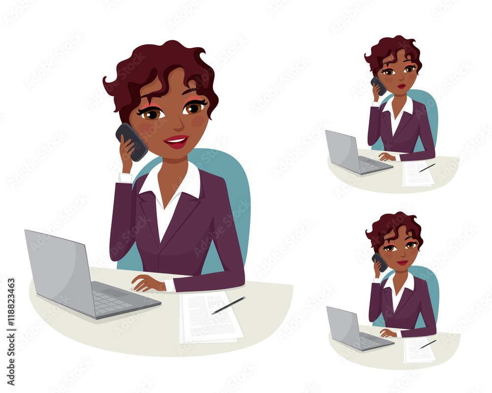 African American business woman on the phone in her office African American business woman on the phone in her office