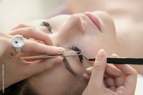 Beauty Model with  Perfect Fresh Skin and Long Eyelashes.