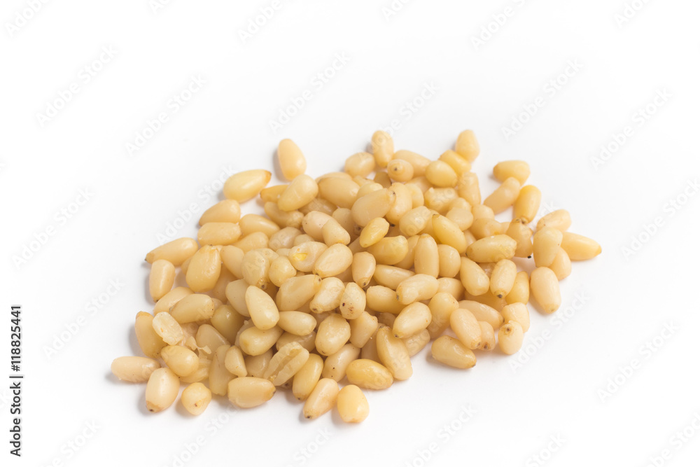 Close-up on Pine Nuts in white background Close-up on Pine Nuts in white background
