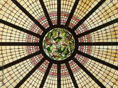 Low angle view of ornate glass ceiling