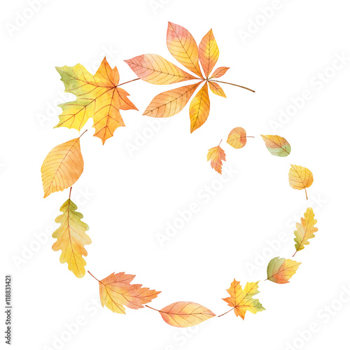 Watercolor round frame with colored leaves on a white background.