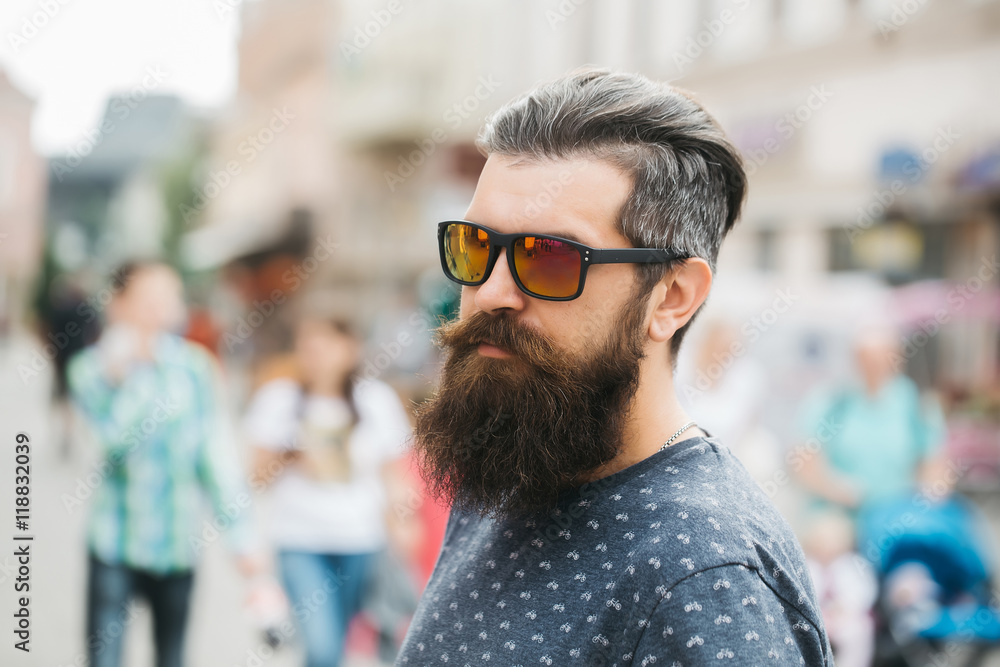 handsome bearded man in sun glasses handsome bearded man in sun glasses