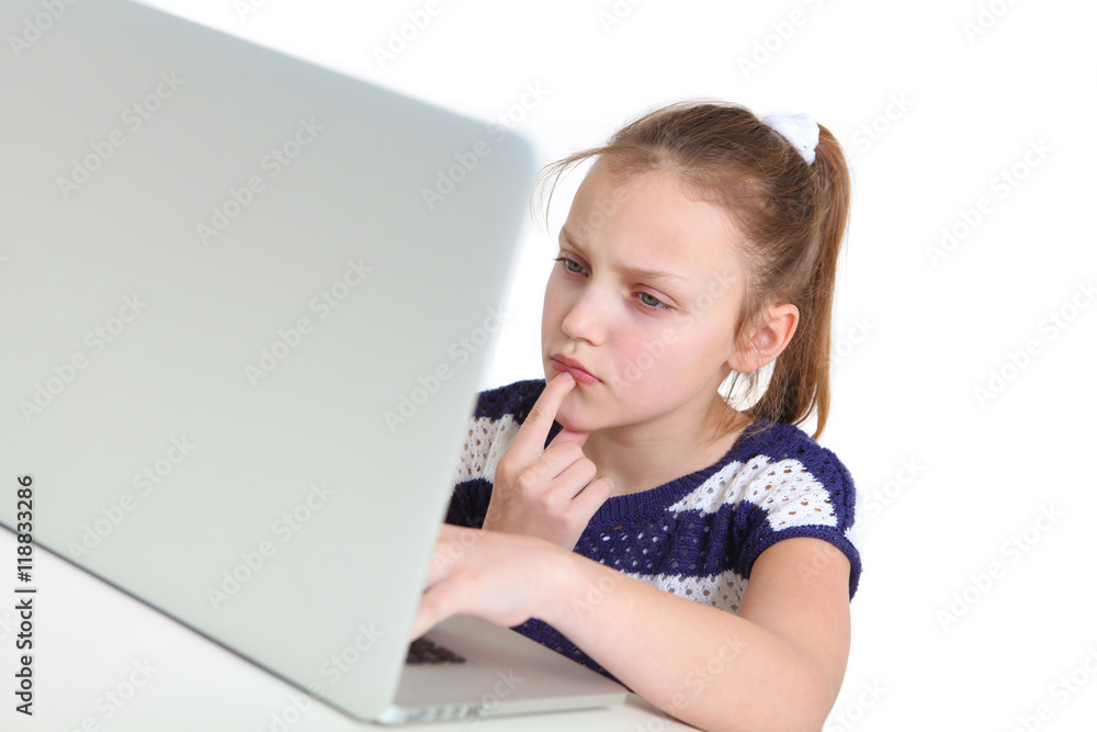 preteen girl using laptop on white background preteen girl using laptop on white background