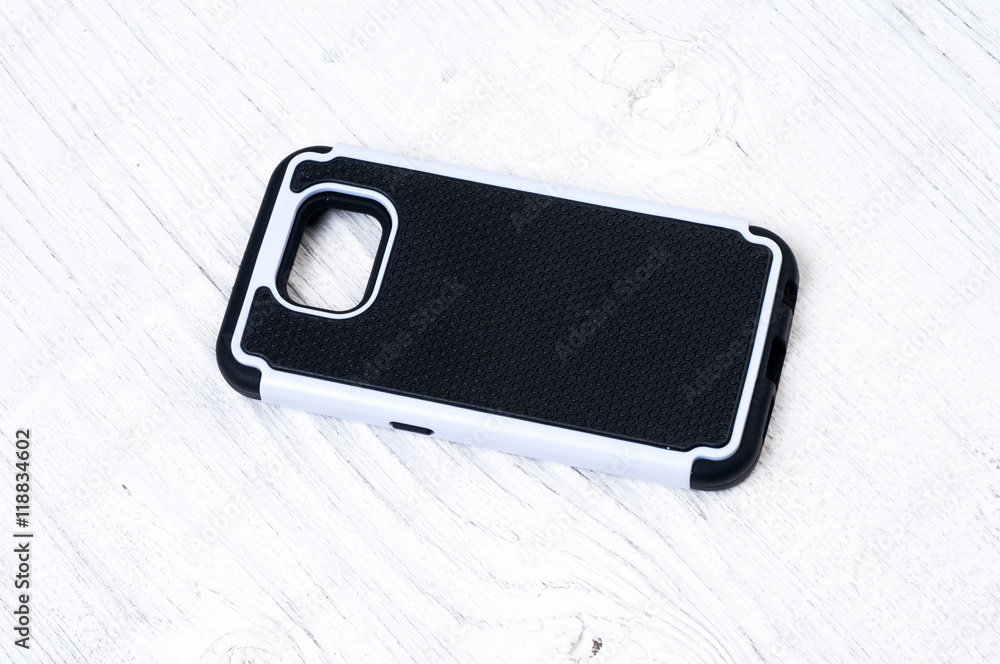 Cover for smart phone on rustik wooden background Cover for smart phone on rustik wooden background