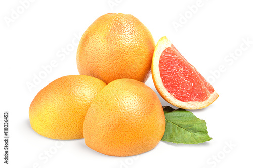 Grapefruit with slice on white background