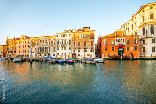 Venice cityscape view on Grand canal with colorful buildings and boats at the sunrise