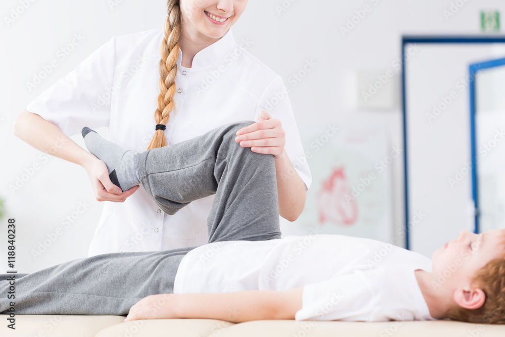 Boy during rehabilitation after injury Boy during rehabilitation after injury