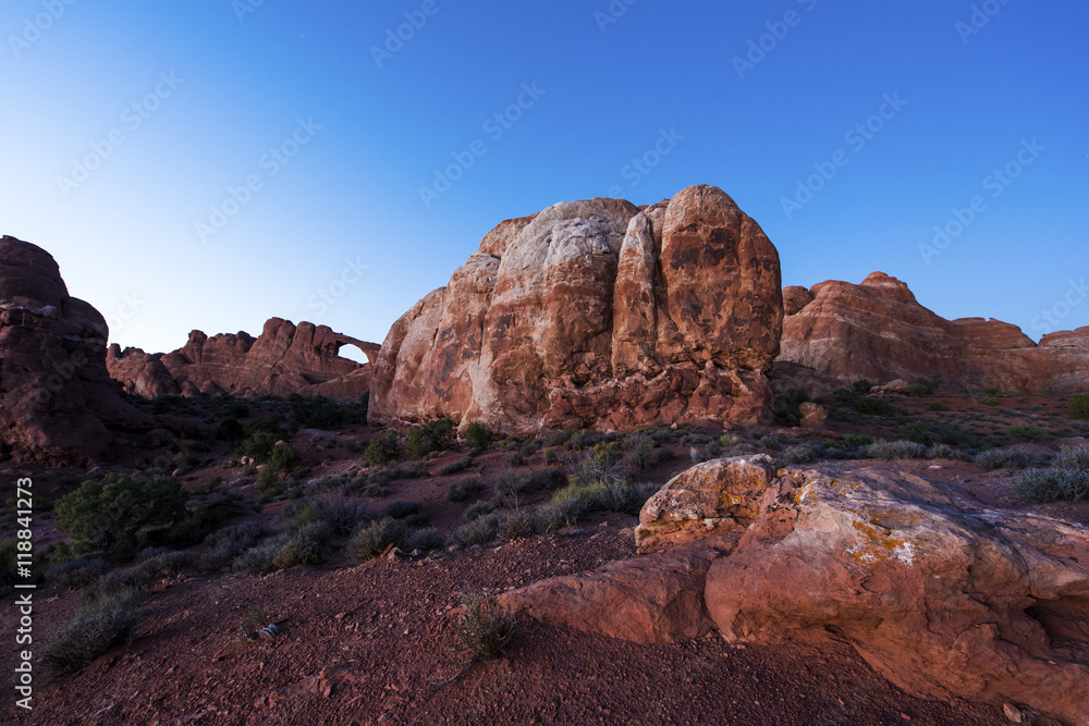 Canyons at Arches National Park with Skyline Arch at Background