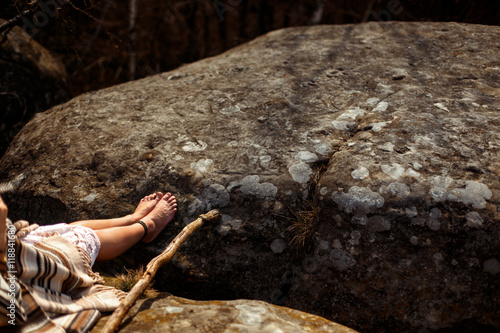 legs shaman boho woman on rocks