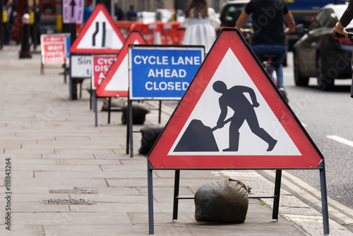 Cycle Lane Closed to Cyclists due to road works showing safety signs.