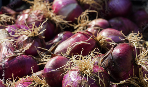 Organic Red onions in plenty at a market