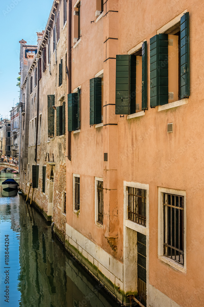 Canal with beautiful medieval facades. Venice, Italy.