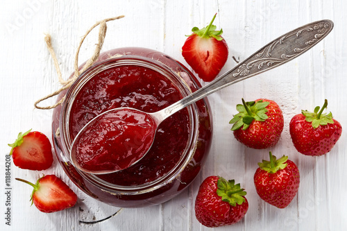 Jar of strawberry jam photo