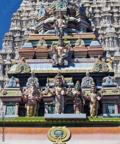 Statue of Shiva, Parvati, Ganesha, Kartika and other Hindu deities in one of the buildings of the temple complex Arunachaleswara (XI century). Tiruvannamalai, India. photo