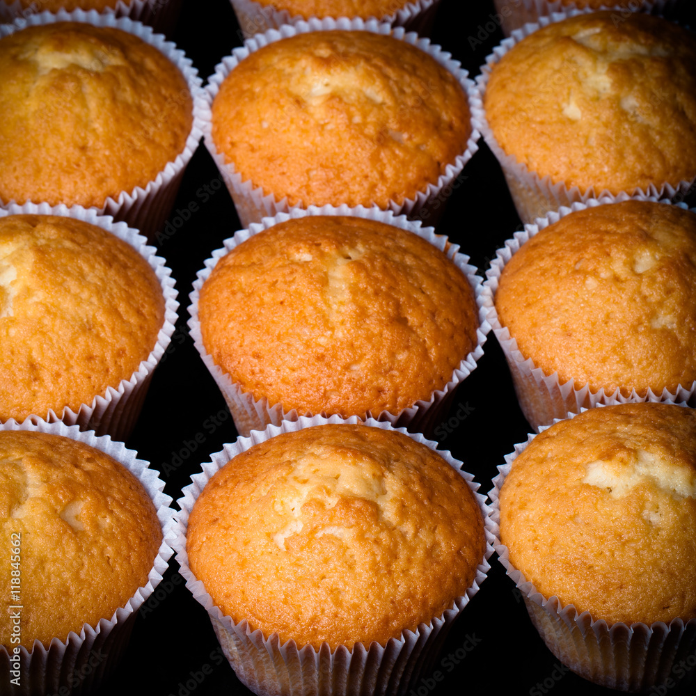 Fresh cupcake desert before decoration. Selective focus. Toned Fresh cupcake desert before decoration. Selective focus. Toned