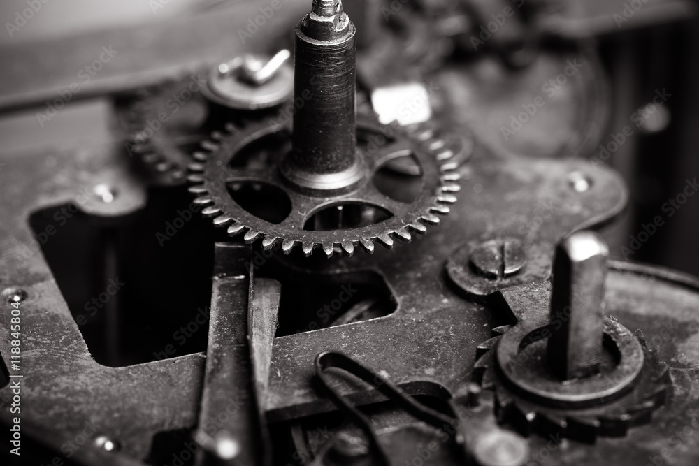 Old clockwork dirty with dust and lubricating oil. Selective foc Old clockwork dirty with dust and lubricating oil. Selective foc