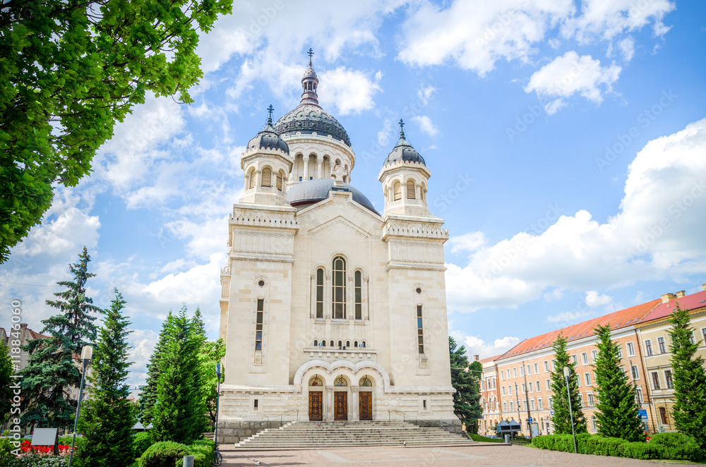 Orthodox Cathedral in Cluj-Napoca Avram Iancu Square in the Transylvania region of Romania on a beautiful sunny summer day with a blue cloudy sky