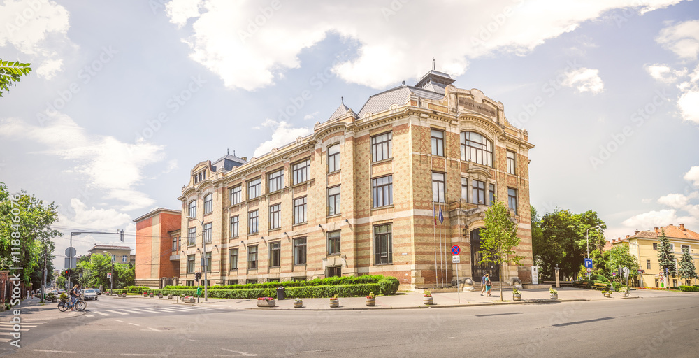 Lucian Blaga Central University Library in this beautiful Transylvanian City in Romania build in art nouveau or wiener secession architectural style with soft filters applied for a warm bright look
