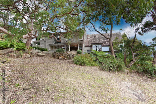 back yard with outdoor seating and barbecue with family