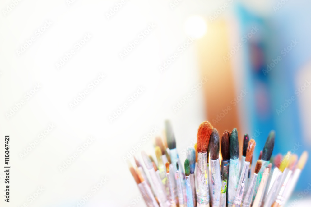 Group of old used paint brushes with clean background,soft focus. Group of old used paint brushes with clean background,soft focus.