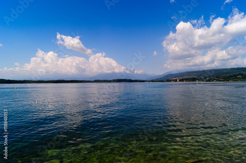 Lake of Viverone panorama with mountains on horizon.