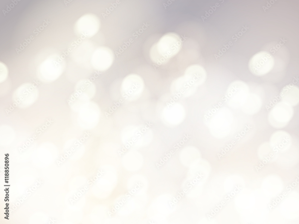 Vector bokeh background. Festive defocused white lights. Abstract blurred illustration.