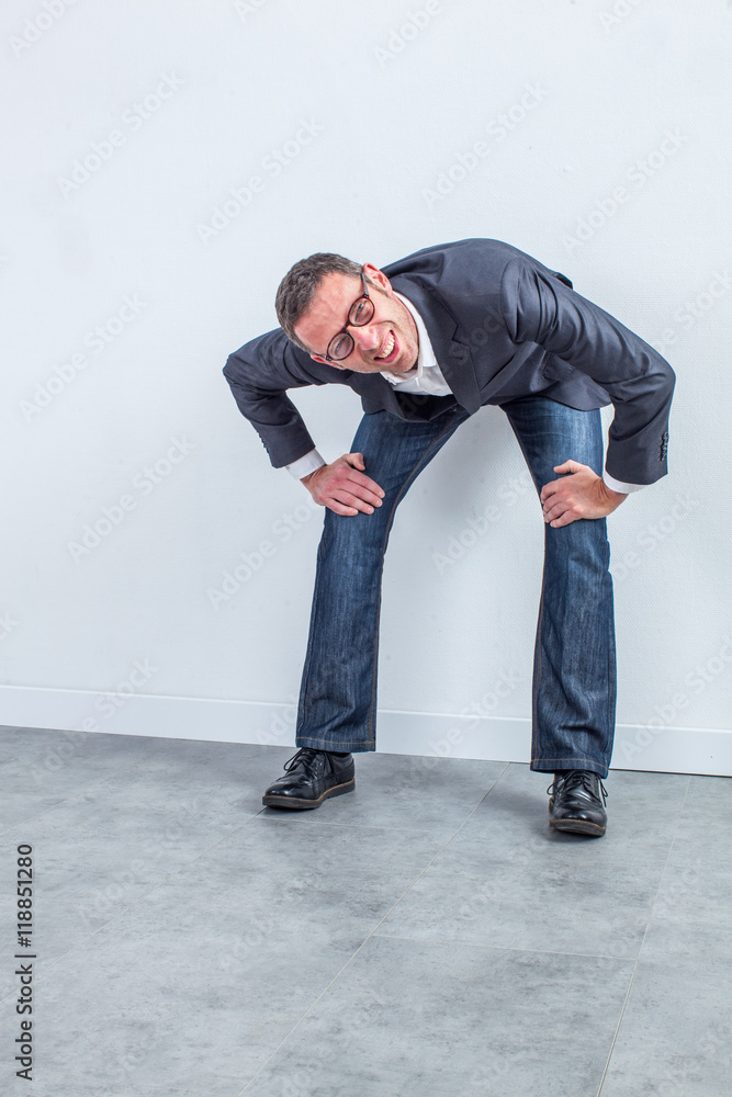 perplexed middle aged businessman with eyeglasses having eyesight problems perplexed middle aged businessman with eyeglasses having eyesight problems