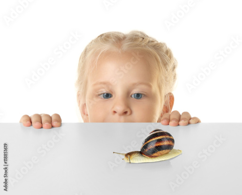 Funny little girl hiding be...