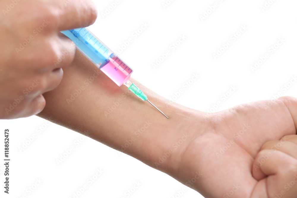 Sportsman injecting himself with steroids, closeup Sportsman injecting himself with steroids, closeup