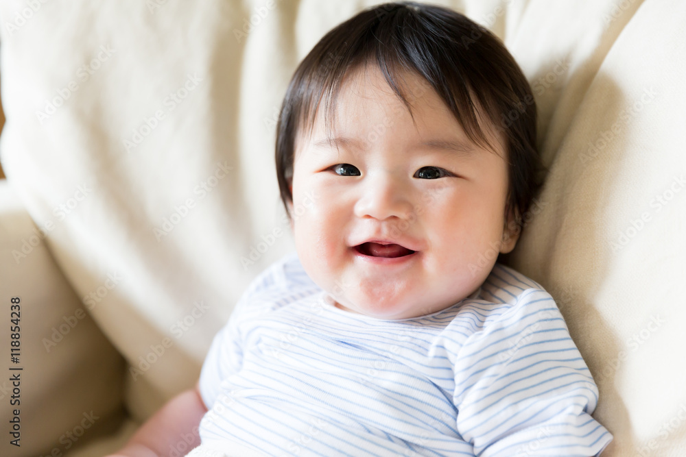 portrait of asian baby on the sofa portrait of asian baby on the sofa