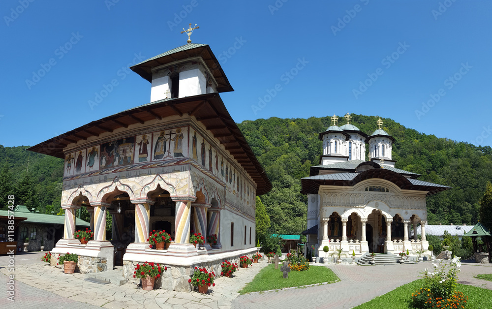 Pair of eastern-orthodox churches in Lainici, Gorj county, Romania