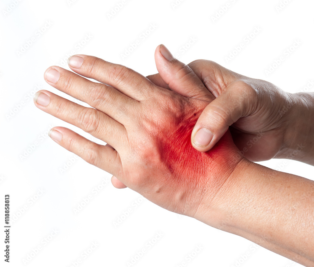 Senior woman touching her injured hand on white background,suffering pain concept Senior woman touching her injured hand on white background,suffering pain concept