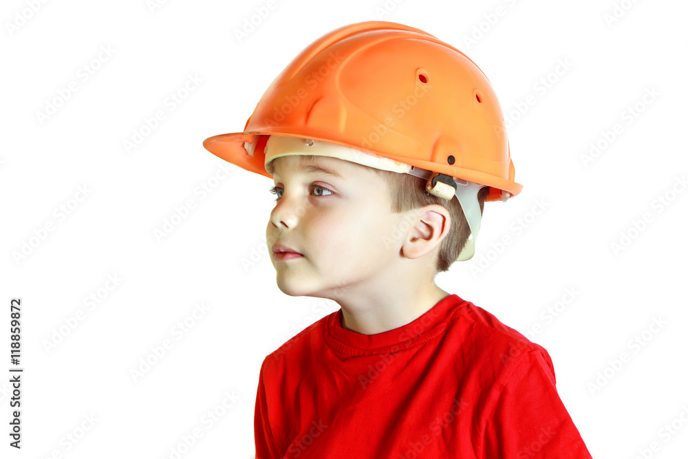 Little builder boy in the construction helmet Little builder boy in the construction helmet