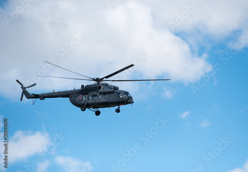 Military helicopter in the sky at day time