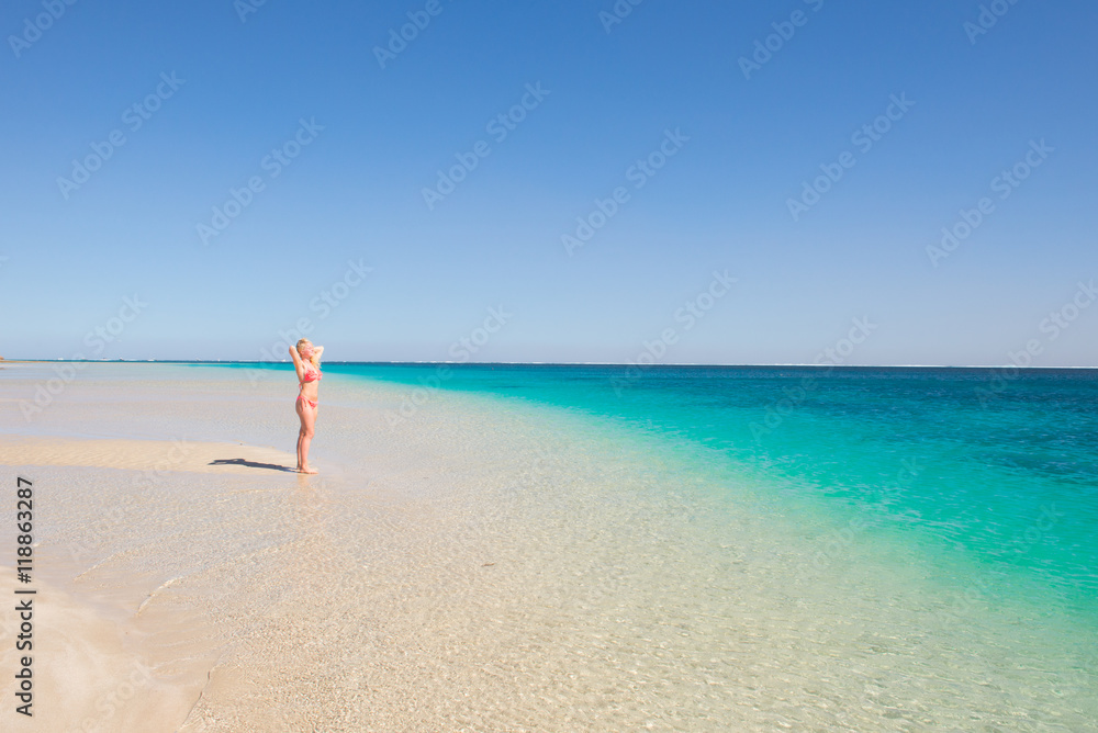 Blonde woman posing paradise beach