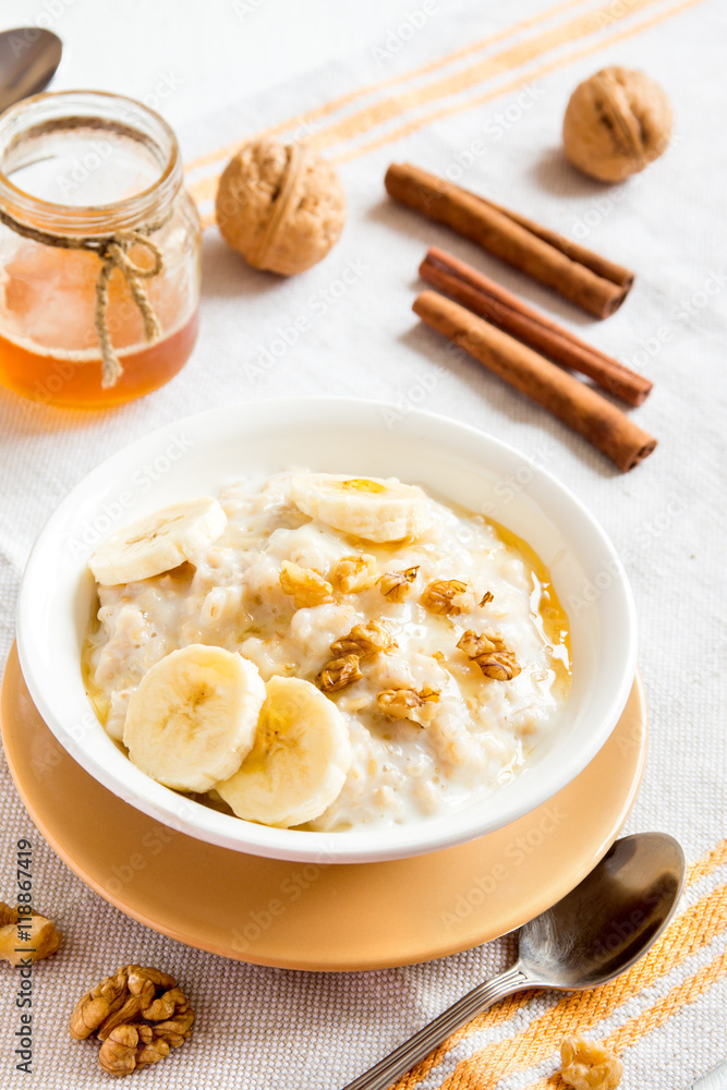 oatmeal porridge with banana, nuts and honey oatmeal porridge with banana, nuts and honey